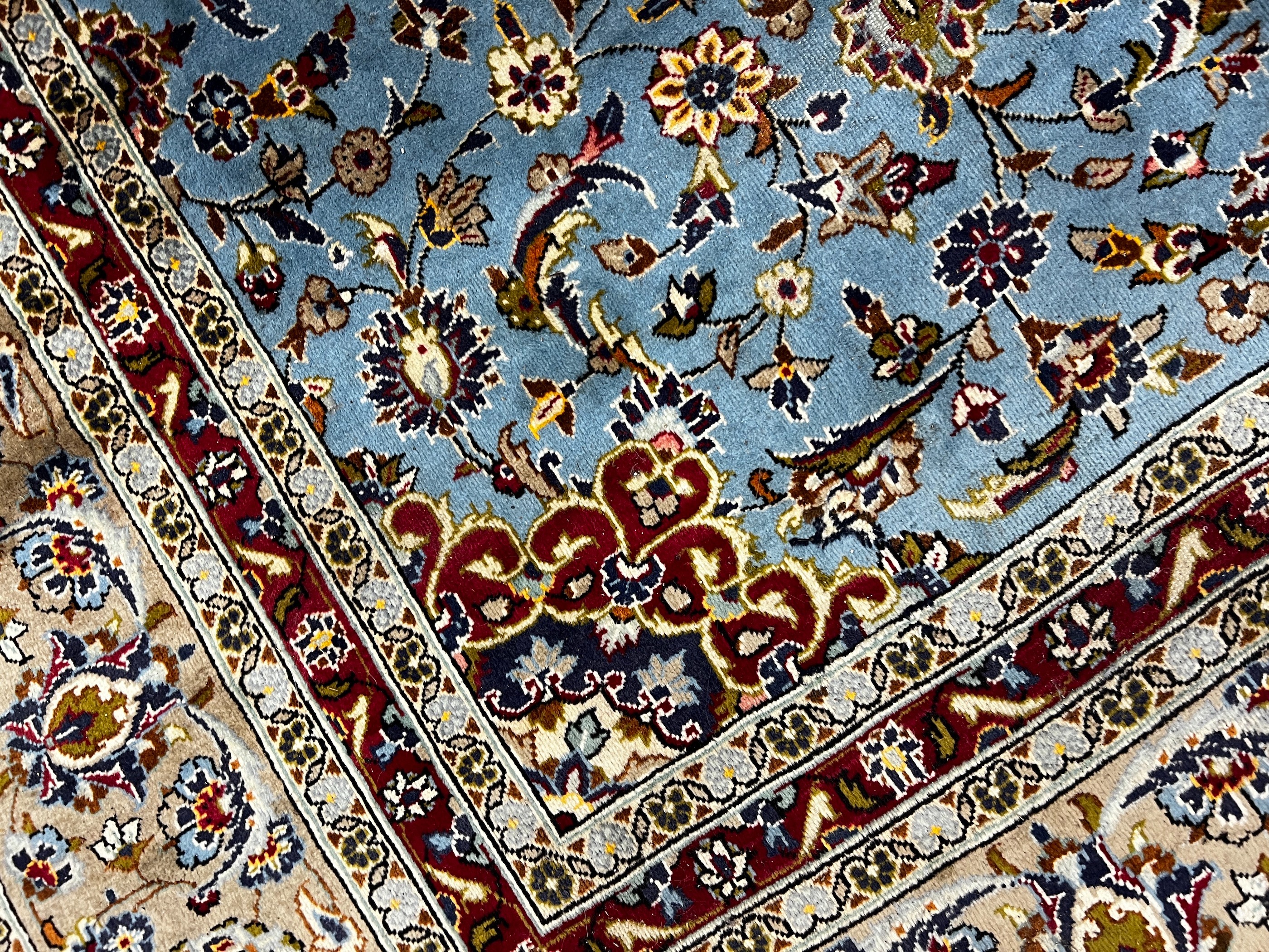 A Kashan blue ground carpet, 242 x 242cm